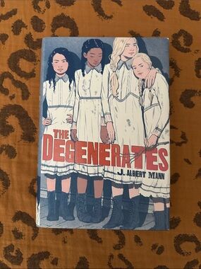 The Degenerates by J. Albert Mann - Illustrated Paperback, Blue/White/Red Cover